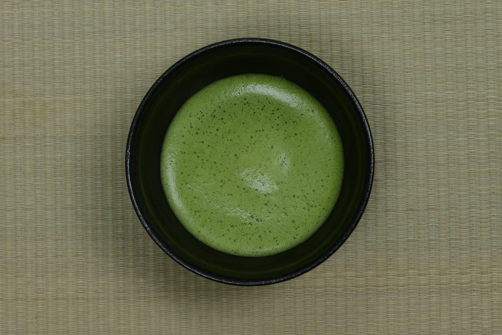 Prepared matcha in a bowl, illustrative serving concept